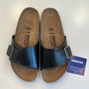 New Birkenstock Black Leather Slip-On Sandals. 
Size 38.